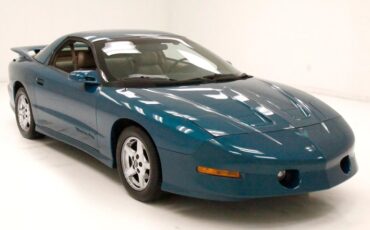 Pontiac-Firebird-1995-Medium-Teal-Blue-Met-Beige-4