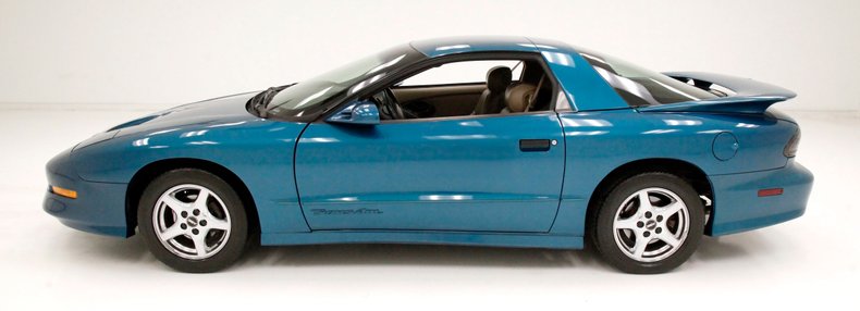 Pontiac-Firebird-1995-Medium-Teal-Blue-Met-Beige