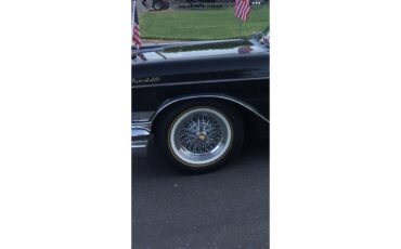 Cadillac-Coupe-deville-1957-PinkBlack-PinkampBlack-1