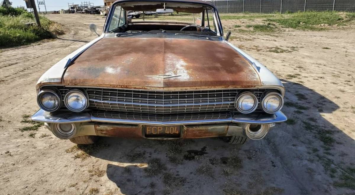 Cadillac-coupe-deville-1961-15