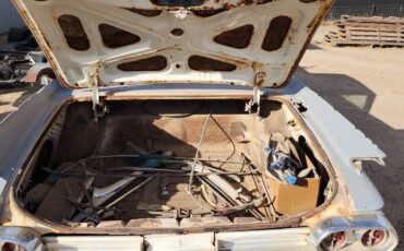 Cadillac-coupe-deville-1961-32