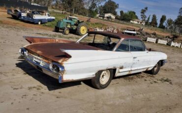 Cadillac-coupe-deville-1961-8