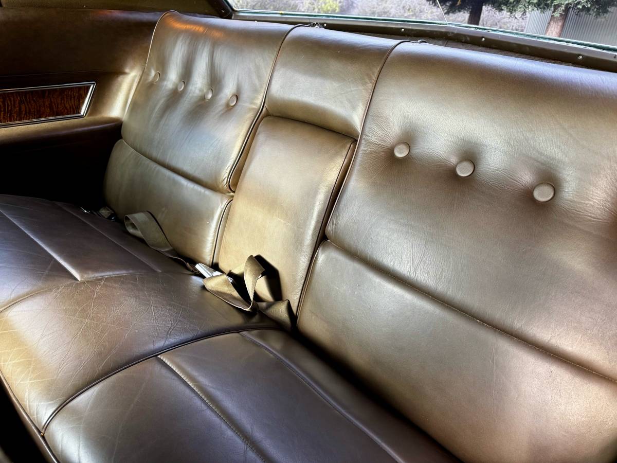 Cadillac-coupe-deville-1970-green-1