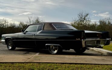 Cadillac-coupe-deville-1970-green-4