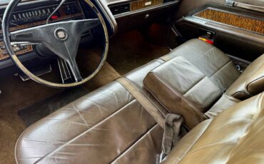 Cadillac-coupe-deville-1970-green-5