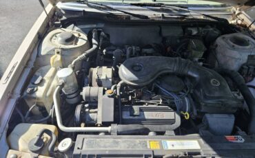 Cadillac-coupe-deville-1989-brown-4