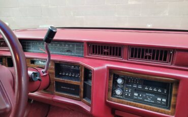 Cadillac-coupe-deville-1993-red-7