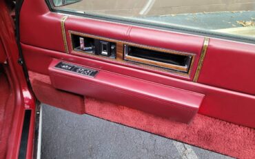 Cadillac-coupe-deville-1993-red-8