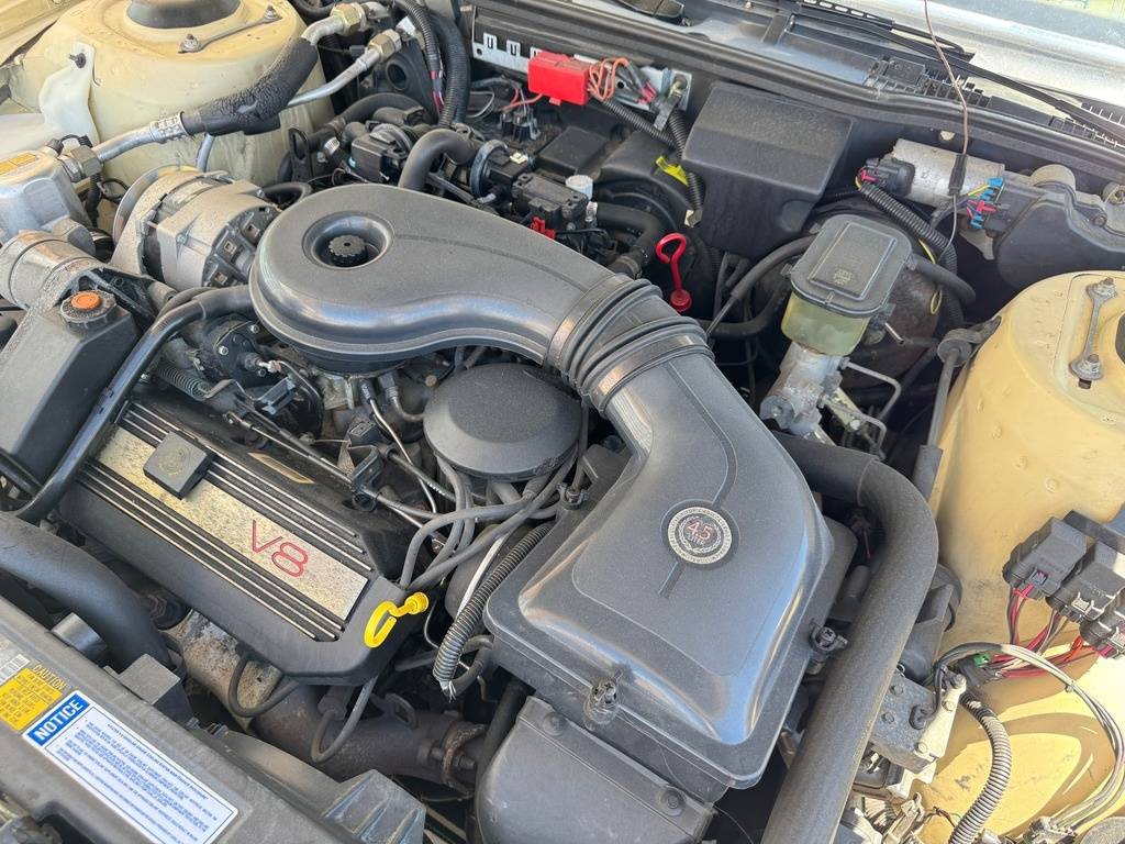 Cadillac-deville-1989-yellow-122