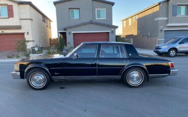 Cadillac-sedan-deville-1976-black