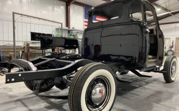Chevrolet-3100-five-window-1950-black-8
