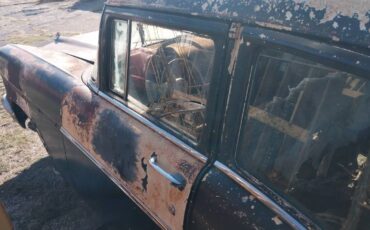 Chevrolet-4dr-1957-black-6