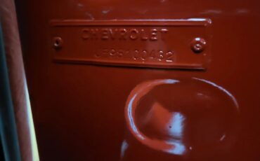 Chevrolet-Corvette-1959-Red-With-White-Coves-Black-14