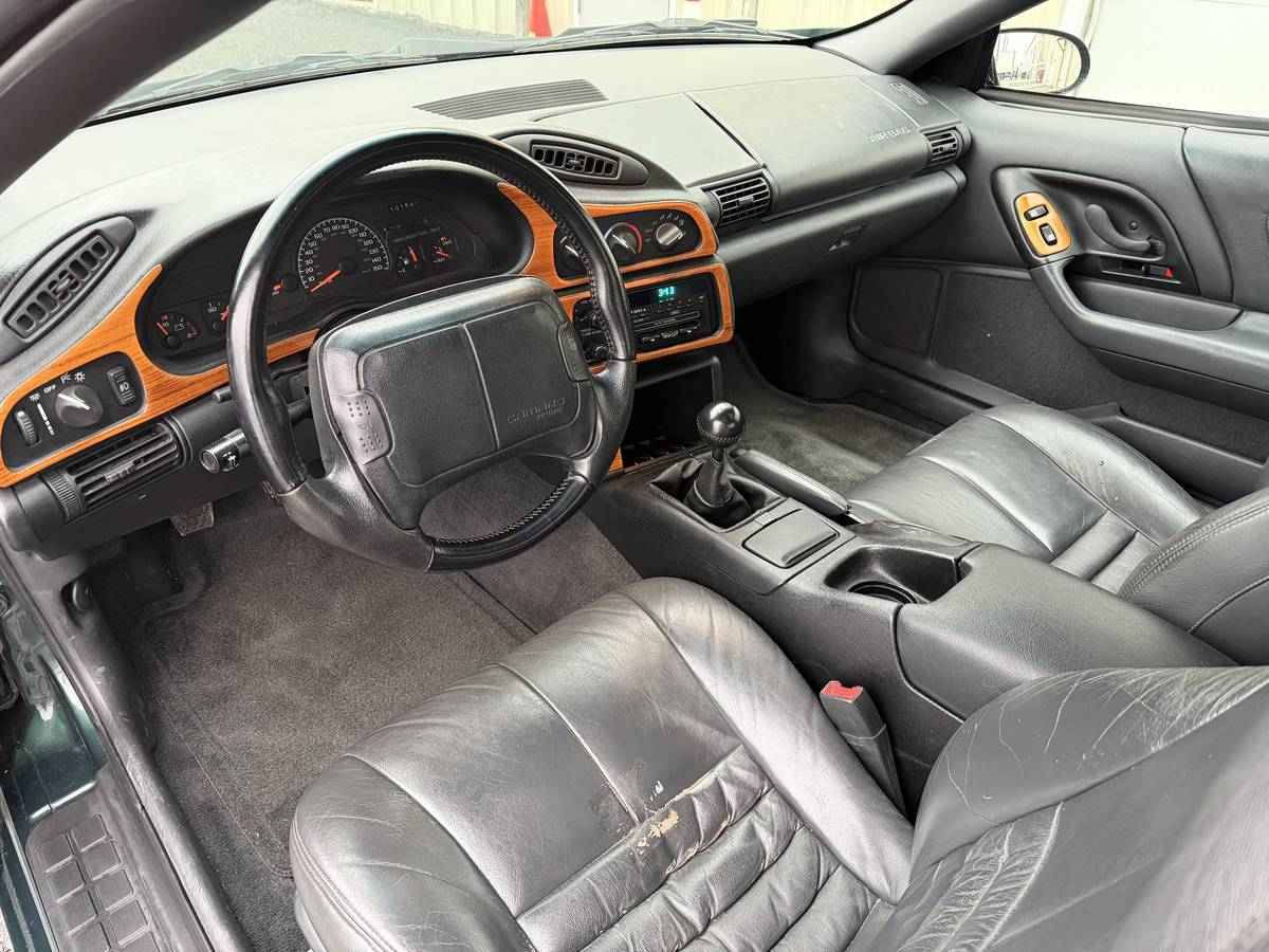 Chevrolet-camaro-z28-1994-green-15