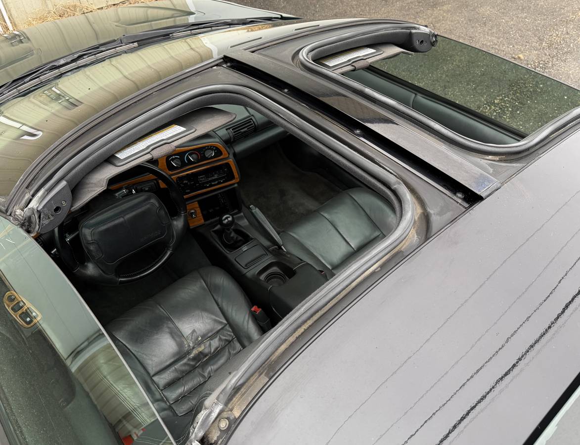 Chevrolet-camaro-z28-1994-green-17