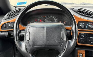 Chevrolet-camaro-z28-1994-green-22