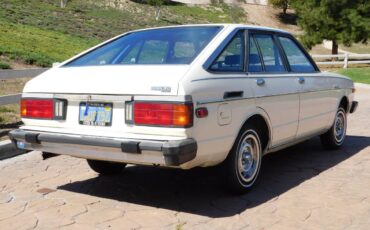 Datsun-510-hatchback-1980-white-1