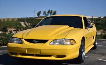 Ford-Mustang-gt-1994-Canary-Yellow-Black-1