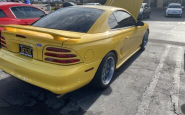 Ford-Mustang-gt-1994-Canary-Yellow-Black-4