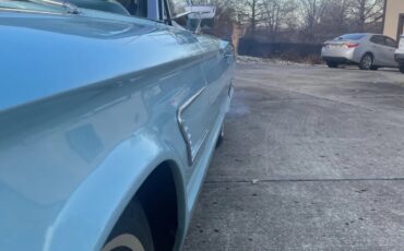 Ford-Thunderbird-1965-Frost-Turguiose-White