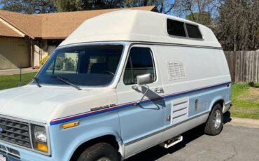Ford-e150-conversion-van-1984-blue