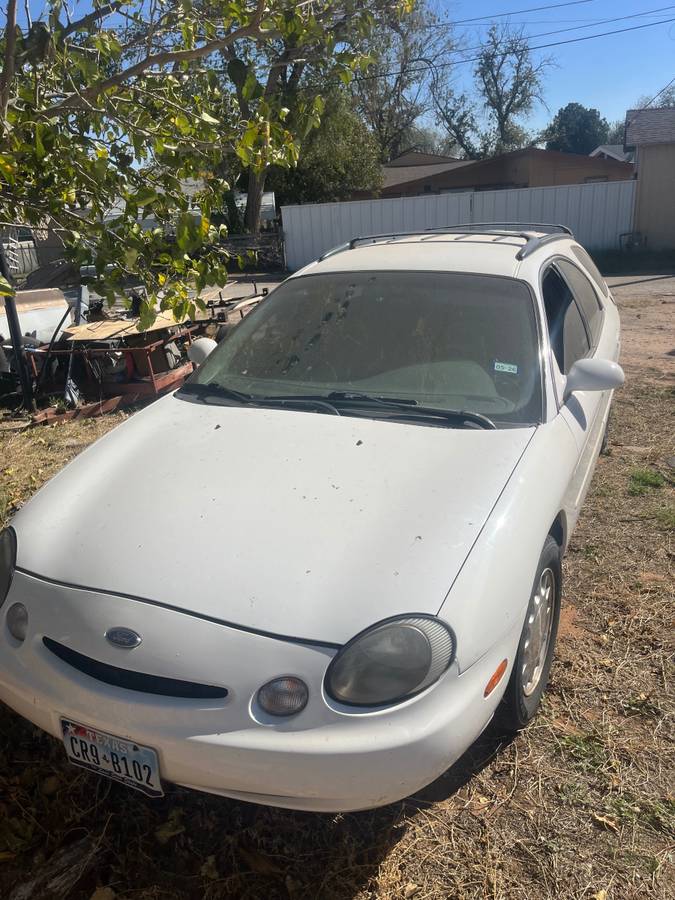Ford-taurus-1996-white-1