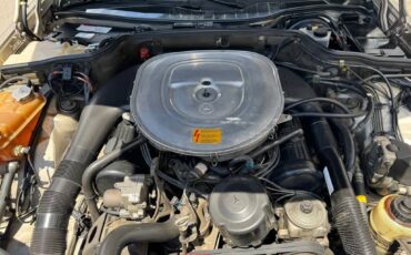 Mercedes-benz-560-class-1988-yellow-49