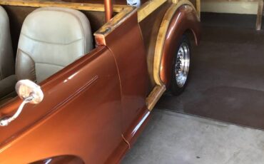 Morris-minor-hybrid-1960-orange-4