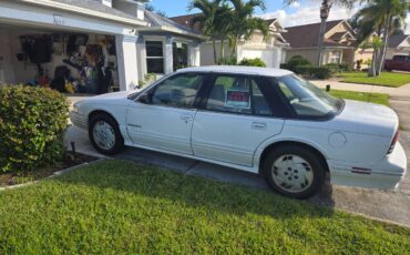 Oksmobile-sedan-1993-white-3