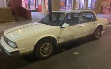 Oldsmobile-98-1988-white-4