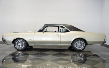 Oldsmobile-Cutlass-1967-Champagne-Metallic-Black-1