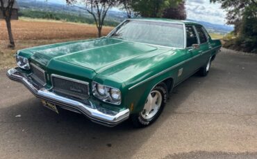 Oldsmobile-delta-88-royale-1973-green-1