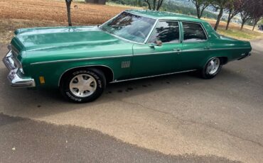 Oldsmobile-delta-88-royale-1973-green-2