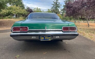 Oldsmobile-delta-88-royale-1973-green-3