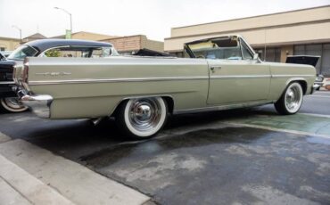 Oldsmobile-f85-cutlass-1963-green-2
