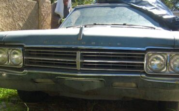 Oldsmobile-starffire-convertible-1965-blue