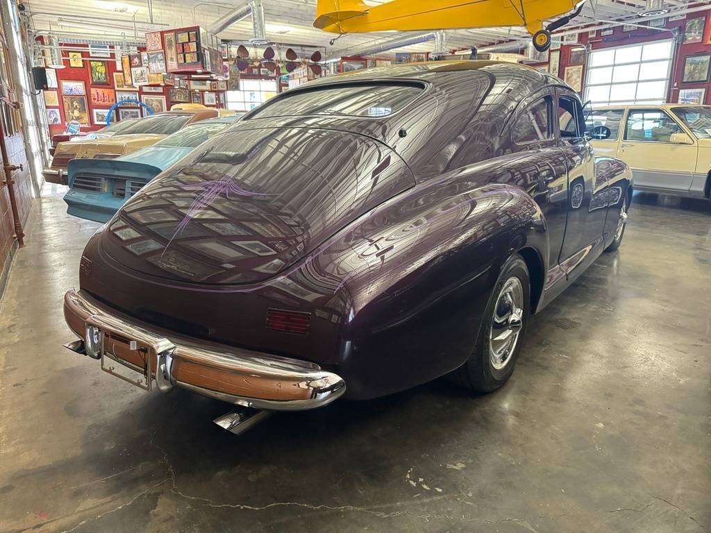 Packard-clipper-custom-street-ro-1947-purple-25