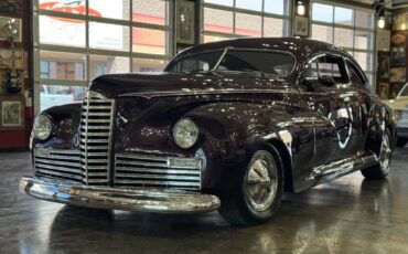 Packard-clipper-custom-street-ro-1947-purple-56