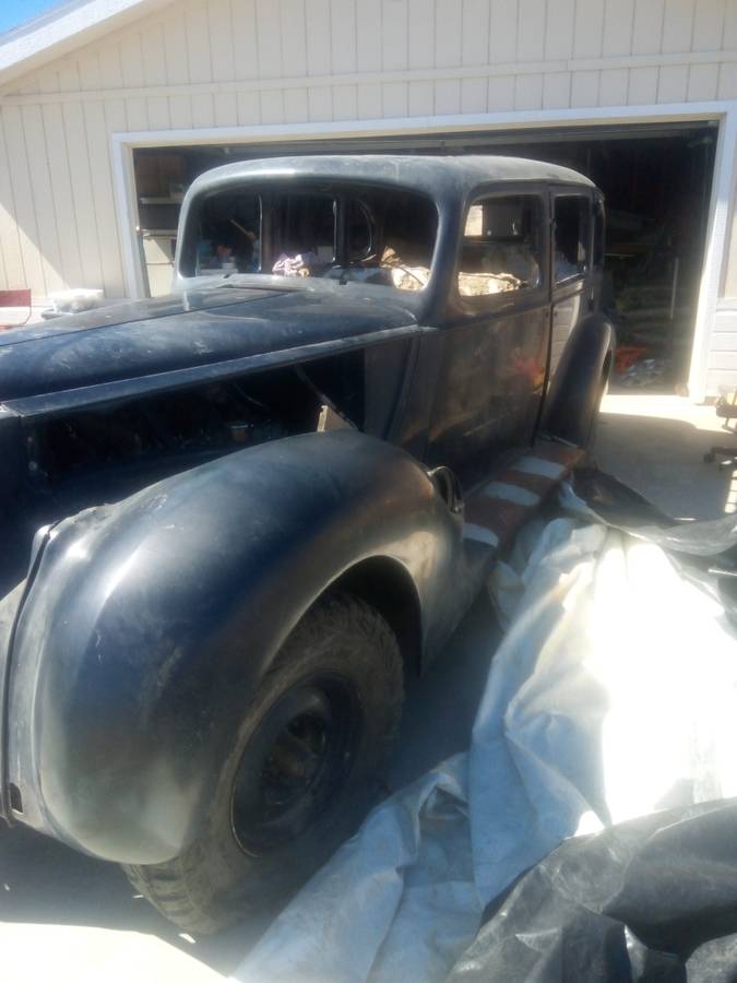 Packard-v-12-touring-sedan-1938-blue-1
