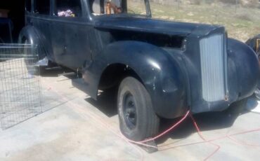 Packard-v-12-touring-sedan-1938-blue
