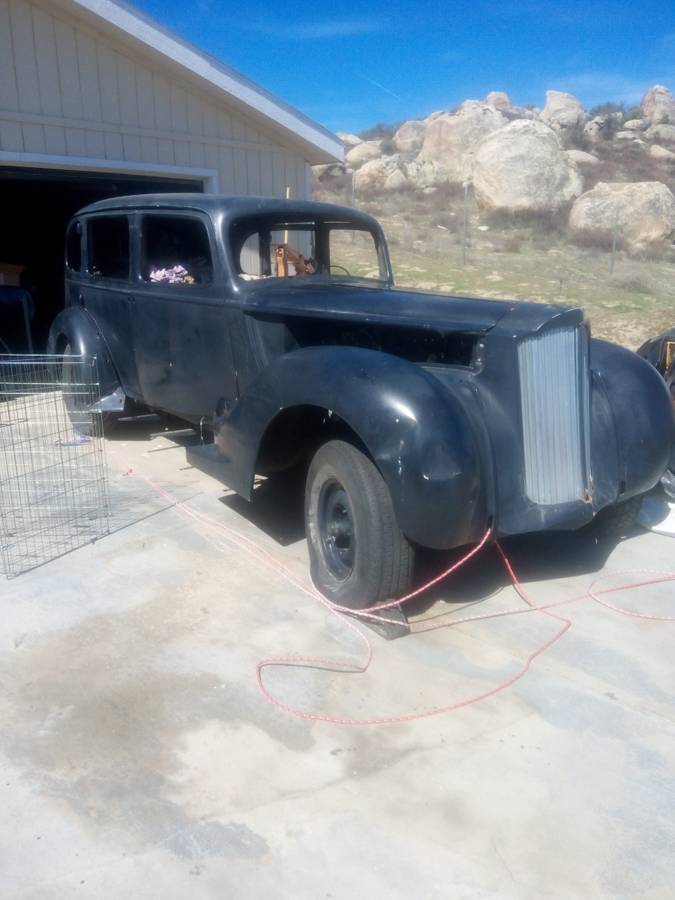 Packard-v-12-touring-sedan-1938-blue