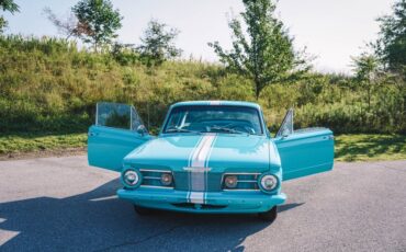 Plymouth-Barracuda-1965-Turquoise-TurquoiseWhite-1