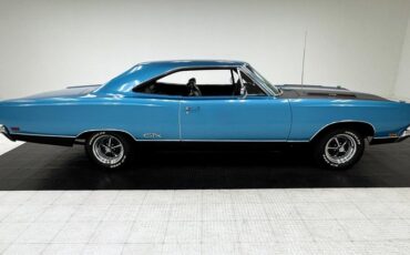 Plymouth-Gtx-1969-Blue-Fire-Metallic-Black-17