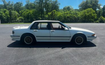 Pontiac-bonneville-1990-white-12