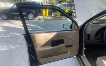 Saturn-S-Series-1995-Sedan-9