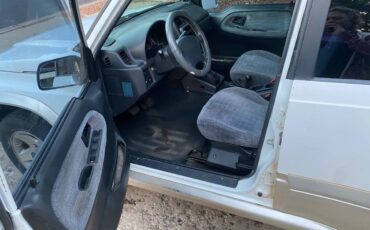 Suzuki-sidekick-1996-white-4