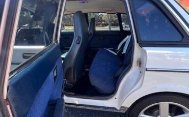 Volvo-240-1990-white-12