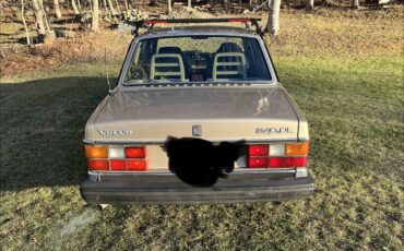 Volvo-240-1990-yellow-11