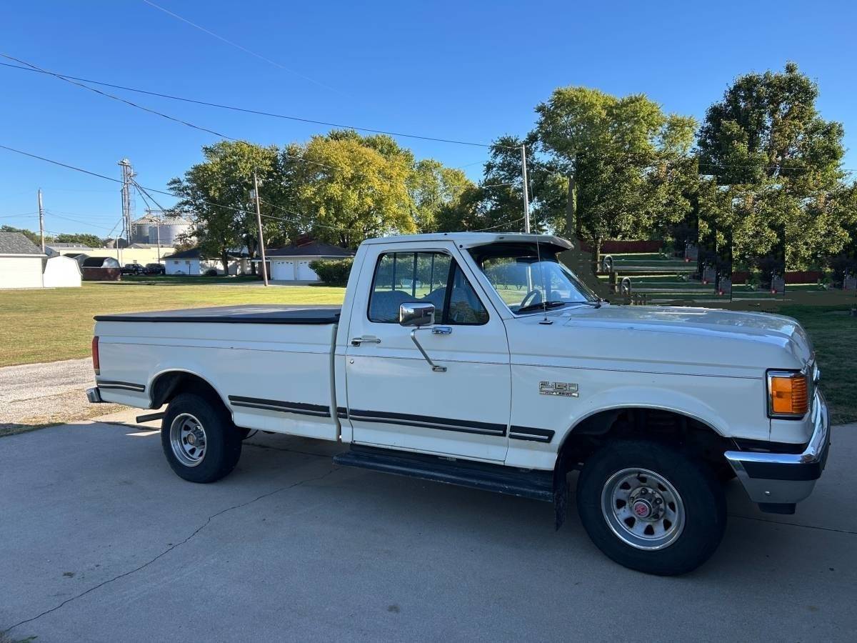 Western-snow-plow-on-ford-f150-xlt-1988-white-2