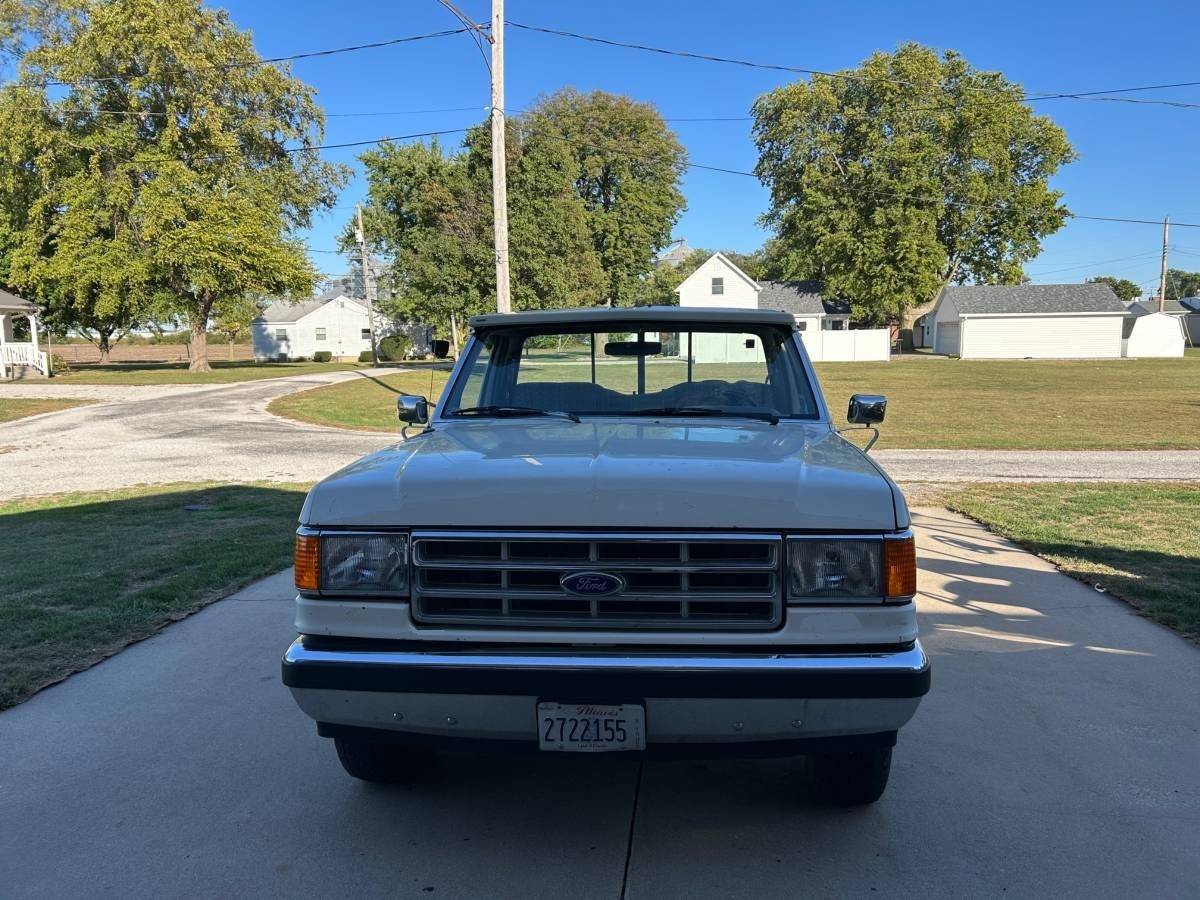 Western-snow-plow-on-ford-f150-xlt-1988-white-8